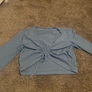 blue long sleeve crop top with tie in front